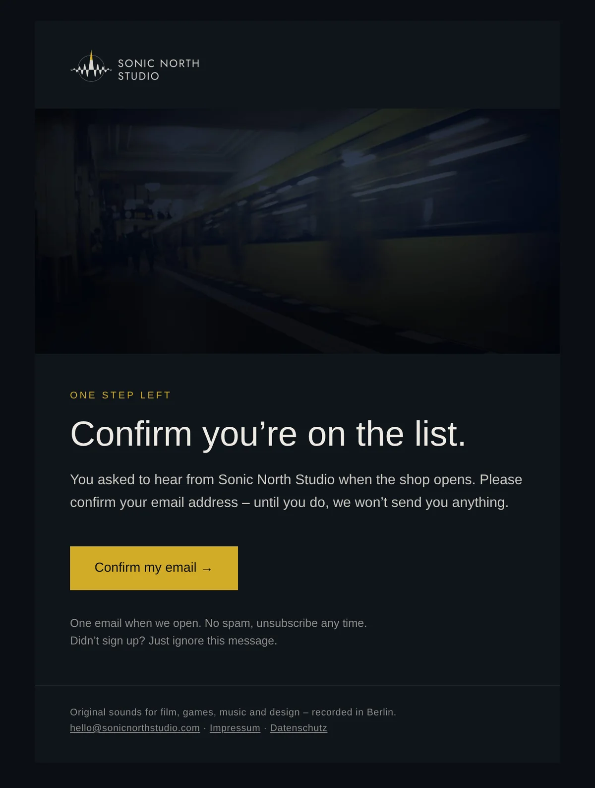 The double opt-in email: the logo, the night photo, the headline 'Confirm you're on the list.' and a yellow Confirm my email button
